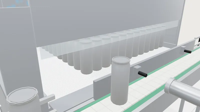 Cans leaving the tunnel discharge onto the conveyor.