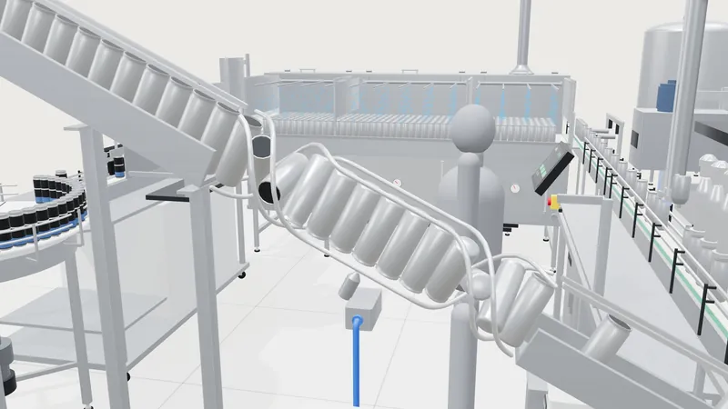 The gravity track and twist rinse carrying cans down from the shaker.